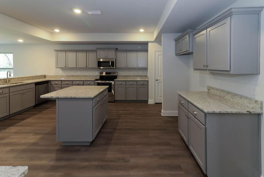 Representative furnished interior of a home built from the Plan 3044 by Adams Homes in Cedar Creek at Deerpoint Lake, Panama City (Image 5).