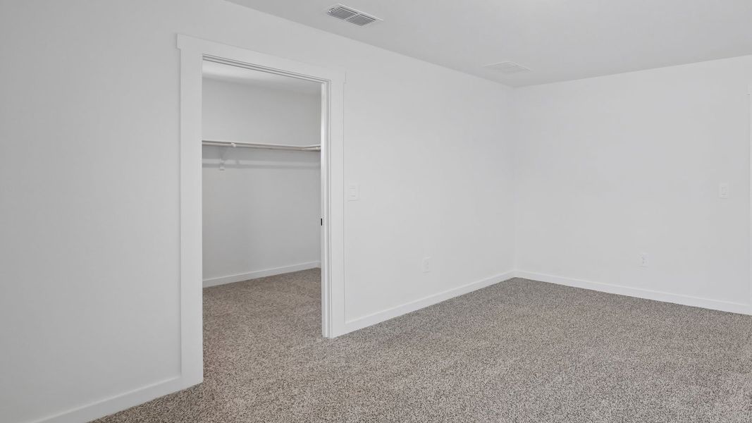 Spacious, unfurnished interior of a new home in Rosenbusch Ranch, Leander (Image 45).