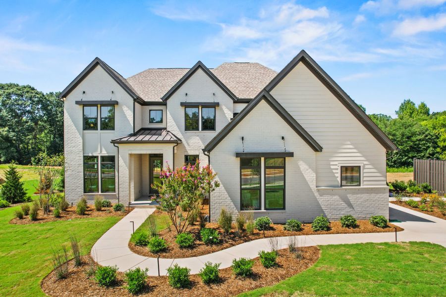 Representative exterior photo of a completed home built from the Hampton by John Wieland in McCoy Farm, Wesley Chapel, NC (Image 26).