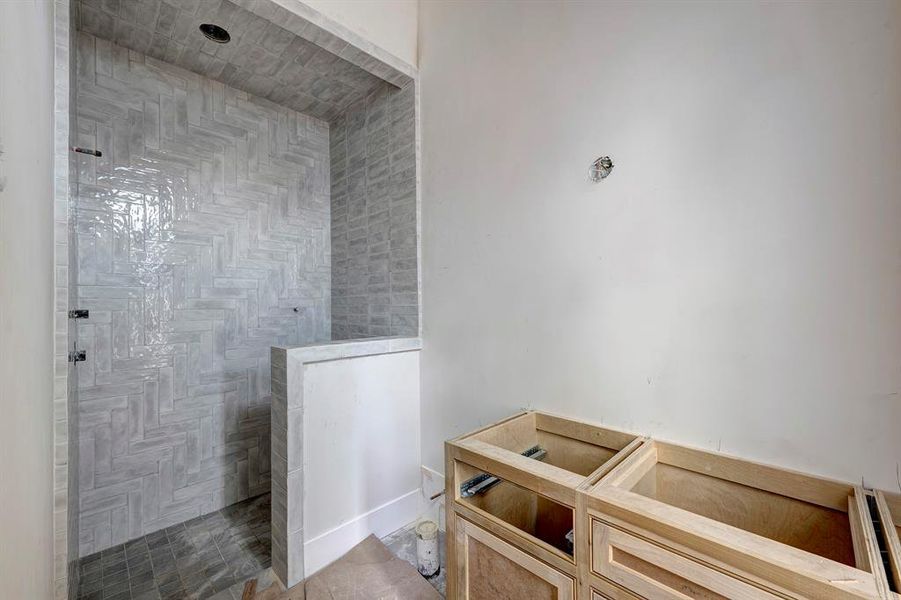 Secondary bathroom with beautiful tile work. Stage of construction as of April 3, 2025. Secondary bathroom with beautiful tile work. Stage of construction as of April 3, 2025.