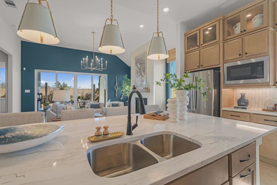 Representative furnished interior of a home built from the Hampton by Chesmar Homes in Meridiana 50's and 60's, Manvel (Image 54).
