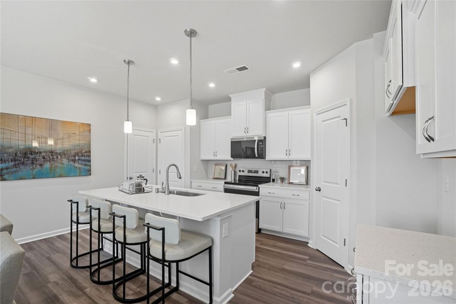 Representational only. Actual exterior elevation and interior finishes can vary.