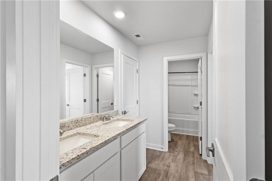 Furnished interior view inside a new home in The Enclave at Dial Farm Phase III, Walnut Grove (Image 7).