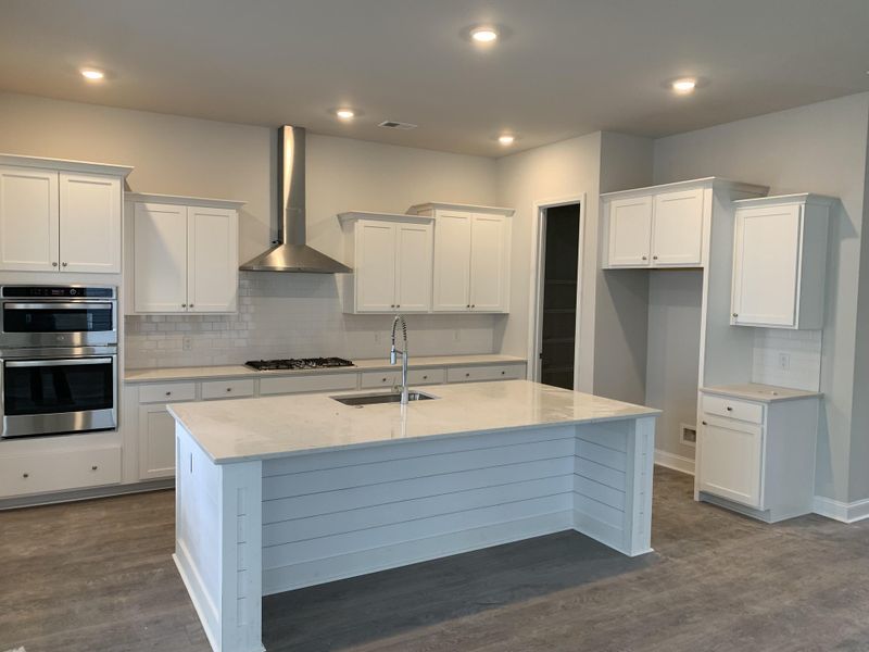 Furnished interior view inside a new home in Sweetgrass at Summers Corner: Row Collection, Summerville (Image 2).