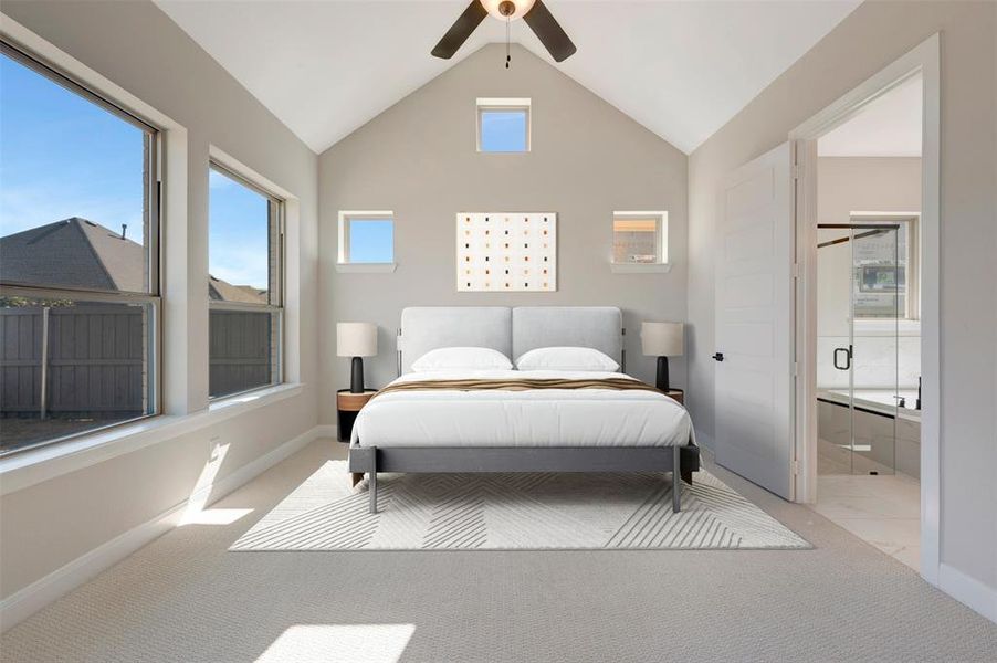 Bedroom with light colored carpet, a ceiling fan, a high ceiling, ensuite bathroom, and multiple windows Bedroom with light colored carpet, a ceiling fan, a high ceiling, ensuite bathroom, and multiple windows