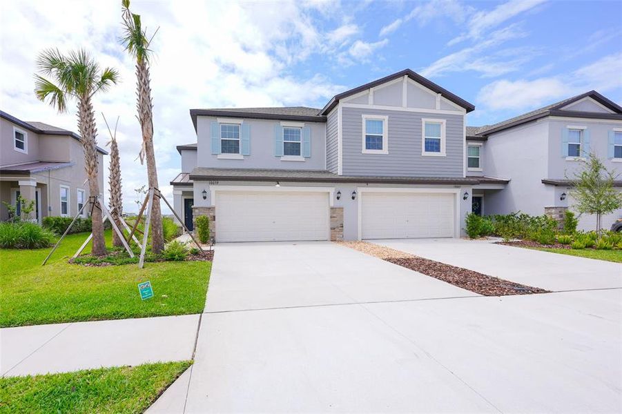 Front exterior of a new home in , San Antonio, FL, highlighting curb appeal (Image 26).