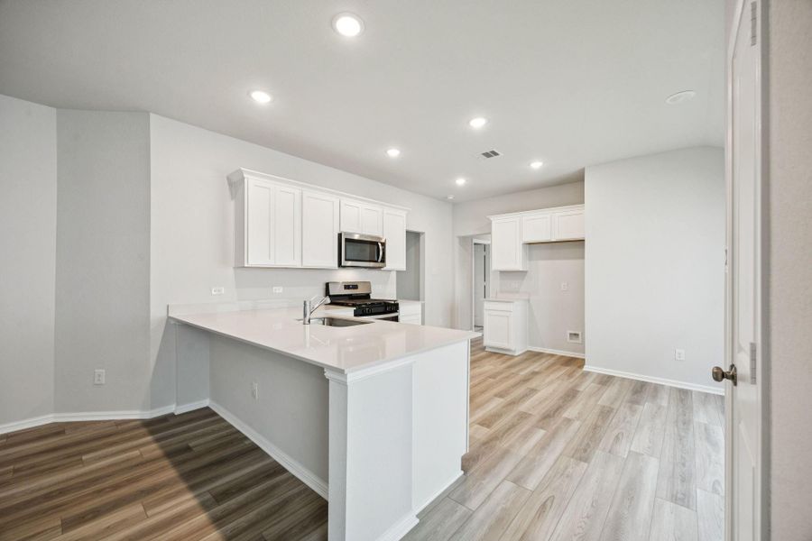 Furnished interior view inside a new home in Saint Tropez, Huffman (Image 5).