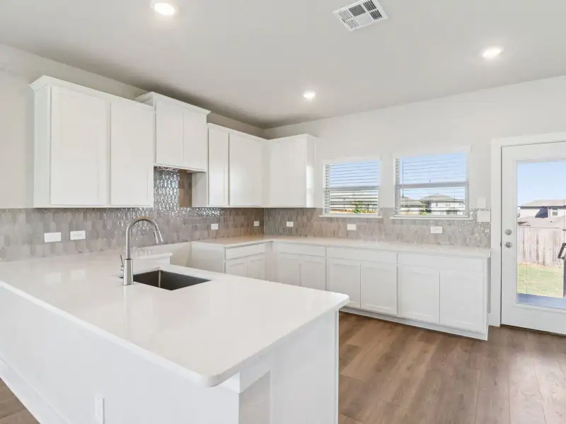 Furnished interior view inside a new home in Legendary Trails - Premier Series, Cibolo (Image 6).