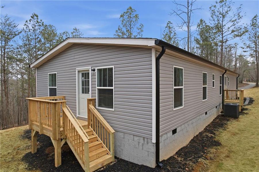 Exterior details and patio area of a home in , Ball Ground (Image 2).
