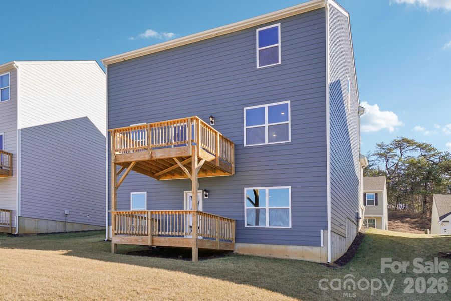 Exterior details and patio area of a home in Rydele Heights, Asheville (Image 4). Exterior details and patio area of a home in Rydele Heights, Asheville (Image 4).