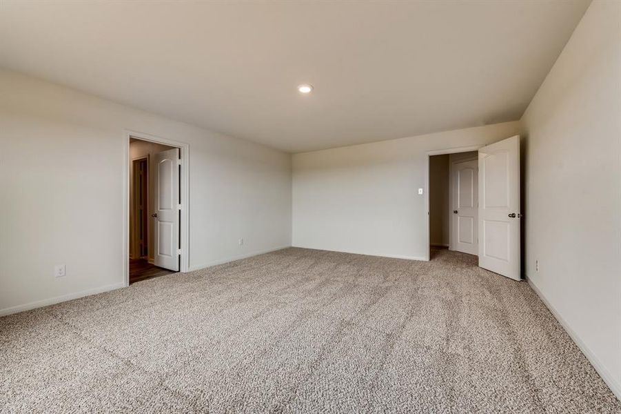 View of carpeted spare room