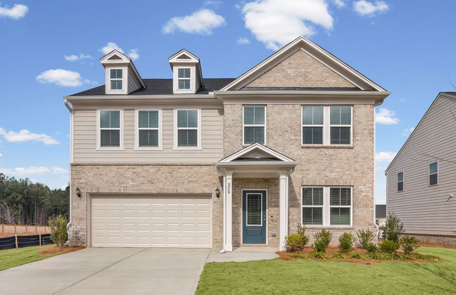 Front exterior of a new home in Hawthorne Ridge, McDonough, GA, highlighting curb appeal (Image 2).