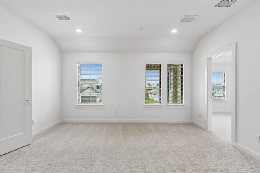 Media Room in the Claret home plan by Trophy Signature Homes – REPRESENTATIVE PHOTO