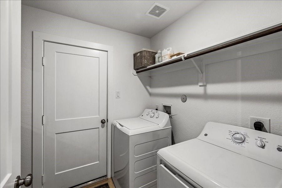 Furnished interior view inside a new home in Mustang Crossing, Alvin (Image 14).
