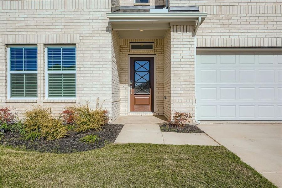 Exterior details and patio area of a home in Summerwood Estates, Red Oak (Image 21).