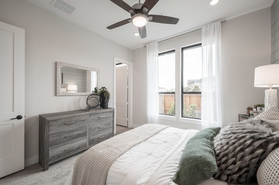 Representative furnished interior of a home built from the Carignan by Tri Pointe Homes in Woodson’s Reserve, Spring (Image 40).