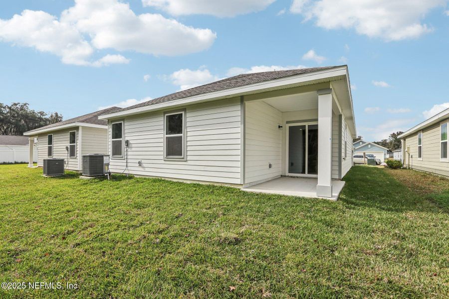 Exterior details and patio area of a home in Kings Landing, Jacksonville (Image 21).