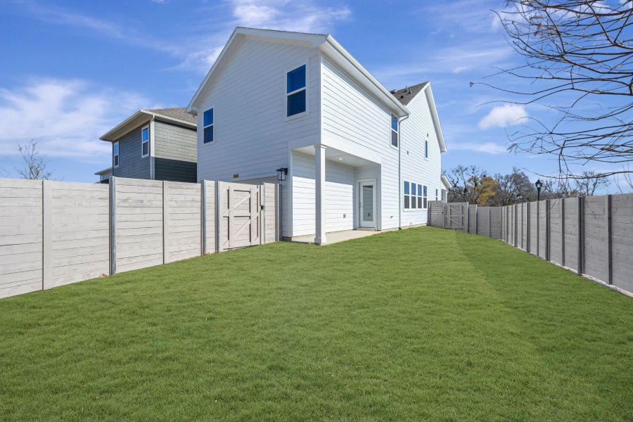 Exterior details and patio area of a home in Painted Tree Woodland West – Cottages, McKinney (Image 3).