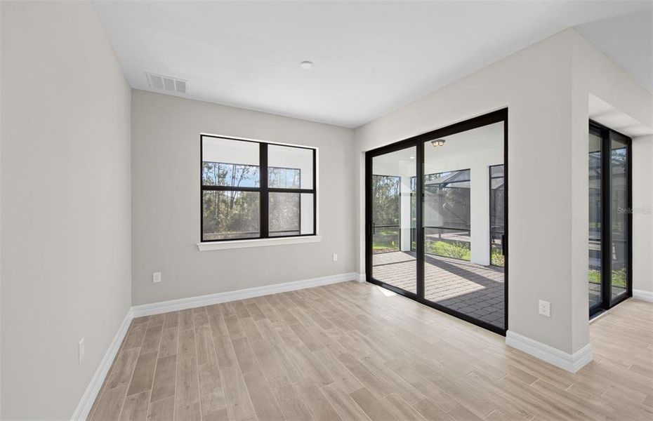 Spacious, unfurnished interior of a new home in Cedar Grove at The Woodlands, North Port (Image 18).