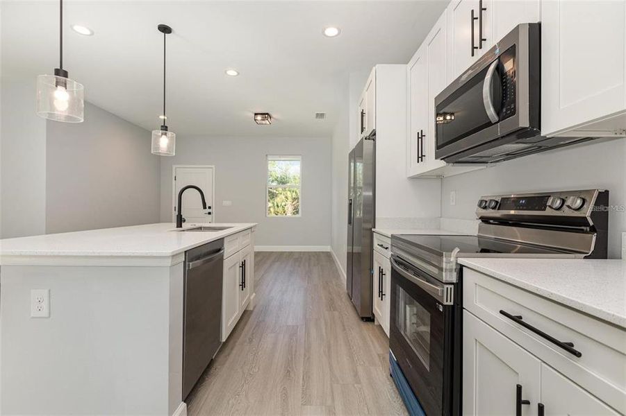 Furnished interior view inside a new home in , Port Charlotte (Image 5).