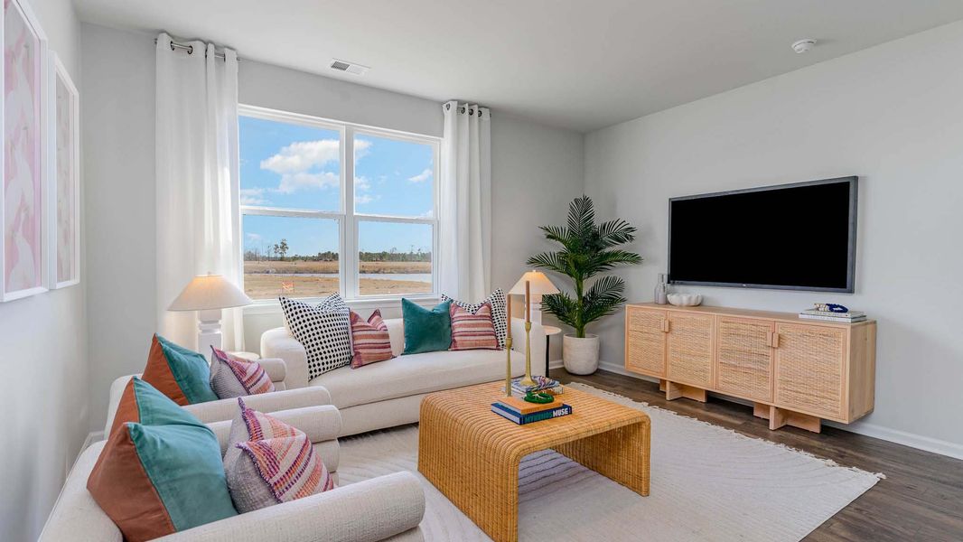 Representative furnished interior of a home built from the CALI by D.R. Horton in Sandridge Park, Little River (Image 15).