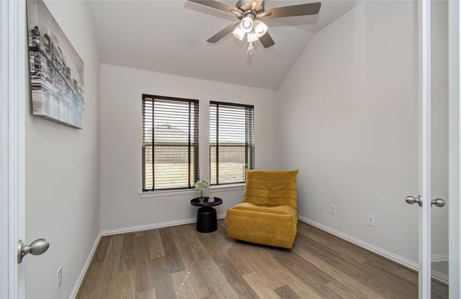 Furnished interior view inside a new home in Sunterra, Katy (Image 13).