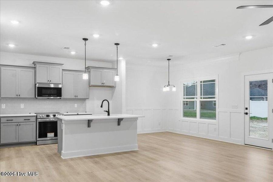 Furnished interior view inside a new home in Wood Creek Landing, Leland (Image 10).