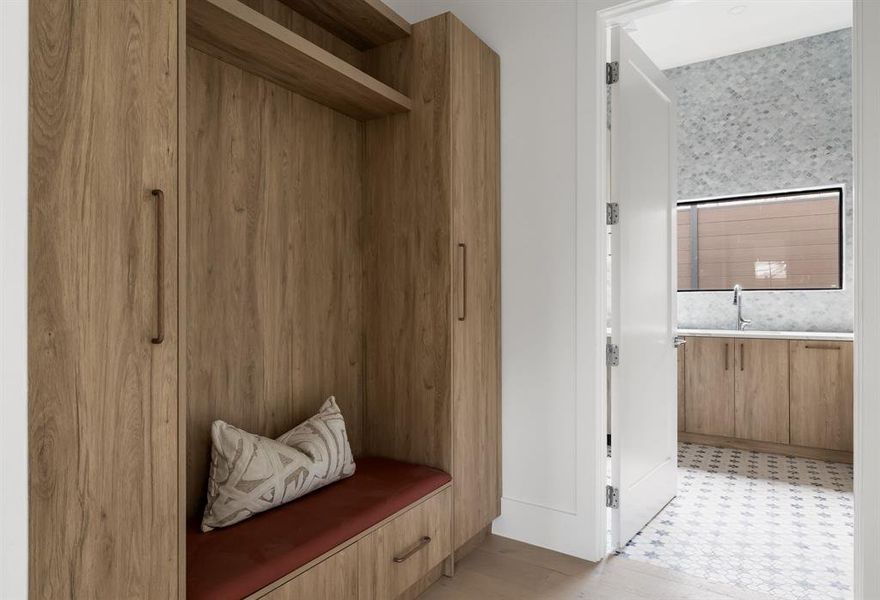 Mudroom with light floors