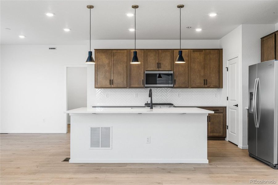 Furnished interior view inside a new home in Harvest Crossing, Aurora (Image 14).
