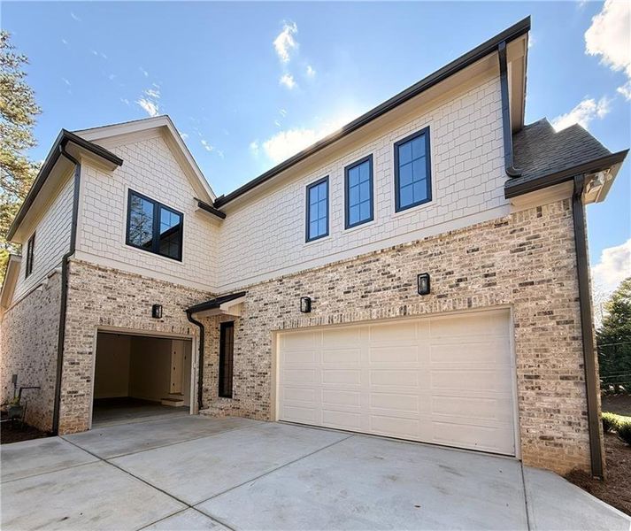 Front exterior of a new home in , Marietta, GA, highlighting curb appeal (Image 30).