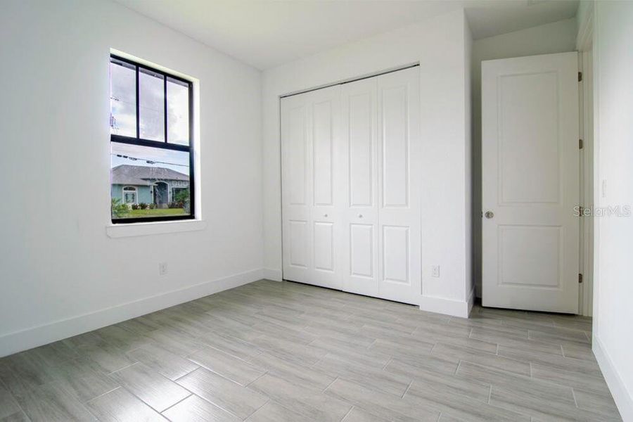 Spacious, unfurnished interior of a new home in , Port Charlotte (Image 20).