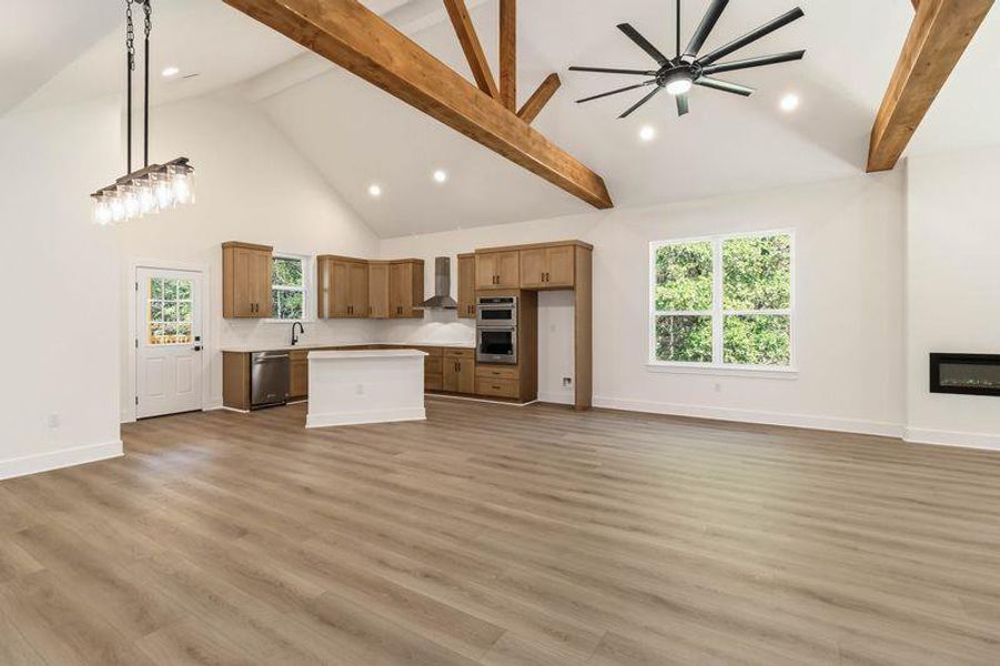 Kitchen opens up to the living room and dining room