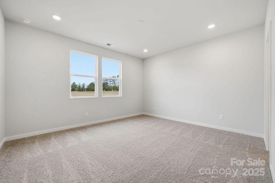 Spacious, unfurnished interior of a new home in Meadow Creek Village, Locust (Image 8).