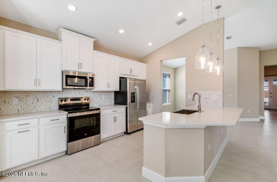 Furnished interior view inside a new home in Colbert Landings, Palm Coast (Image 6).