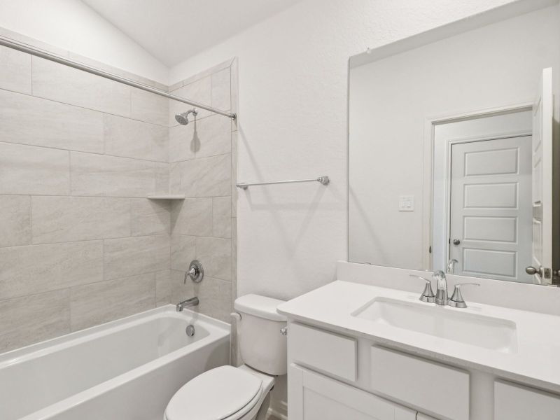Guest bathroom in the Callaghan floorplan at a Meritage Homes community. Guest bathroom in the Callaghan floorplan at a Meritage Homes community.