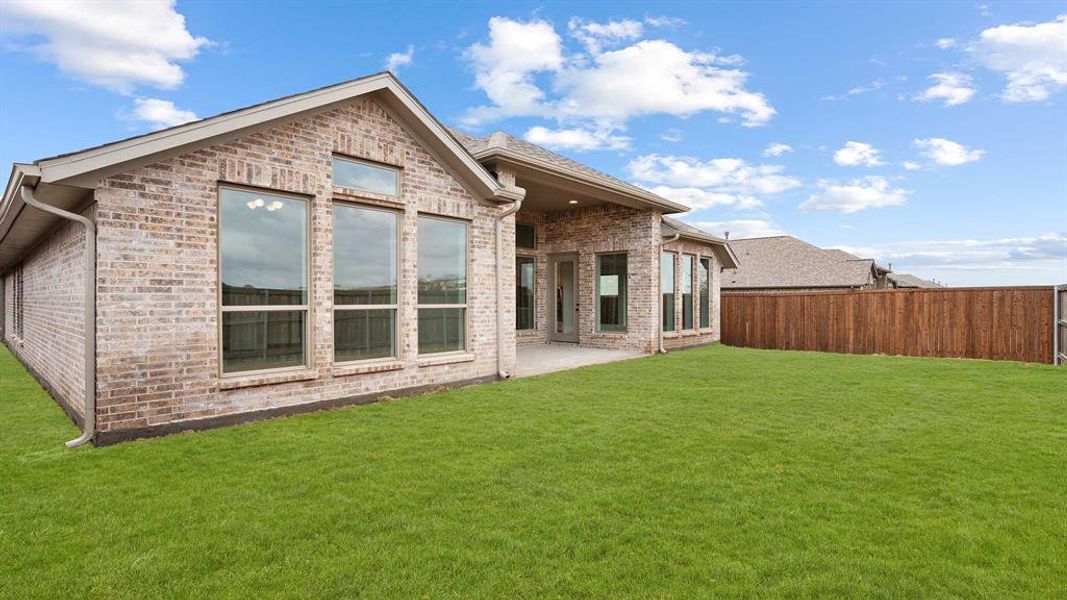 Exterior details and patio area of a home in Devonshire - Reserve 50', Forney (Image 3).