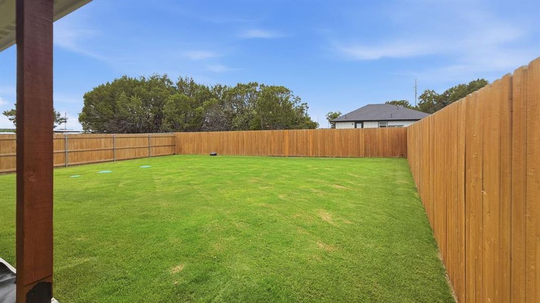 Exterior details and patio area of a home in , Granbury (Image 33). Exterior details and patio area of a home in , Granbury (Image 33).
