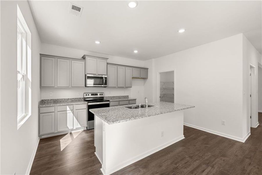Furnished interior view inside a new home in The Reserve at Calcutta, Stockbridge (Image 5).