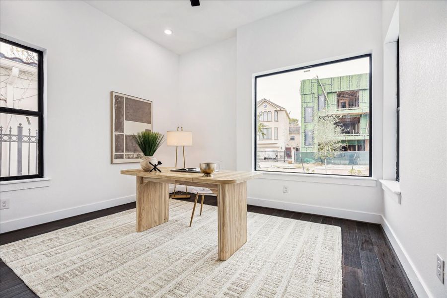 A thoughtfully designed downstairs study provides the perfect balance of privacy and functionality, ideal for working from home or managing daily tasks.