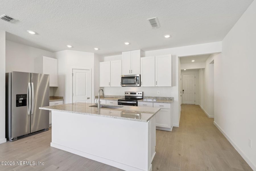Furnished interior view inside a new home in Flagler Village - Signature Series, Palm Coast (Image 10).