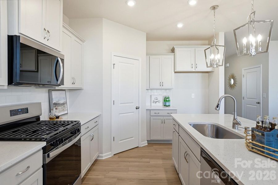 Furnished interior view inside a new home in Waxhaw Landing, Monroe (Image 30).
