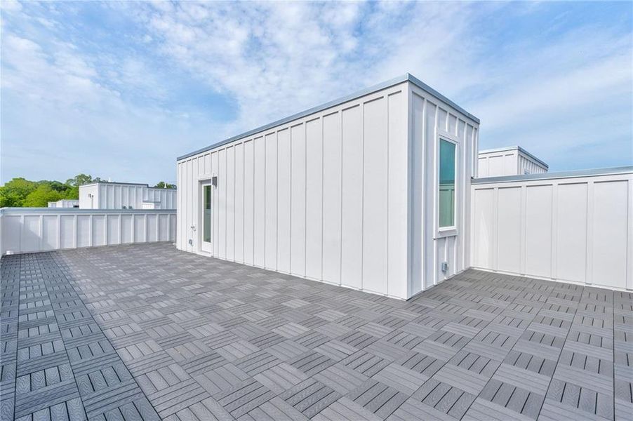 Exterior details and patio area of a home in The Moderns at Sugar Creek Phase III, Atlanta (Image 22).