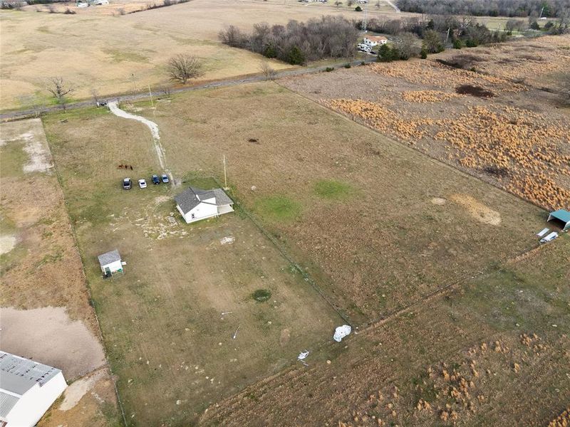 Aerial overview of property's location with rural landscape