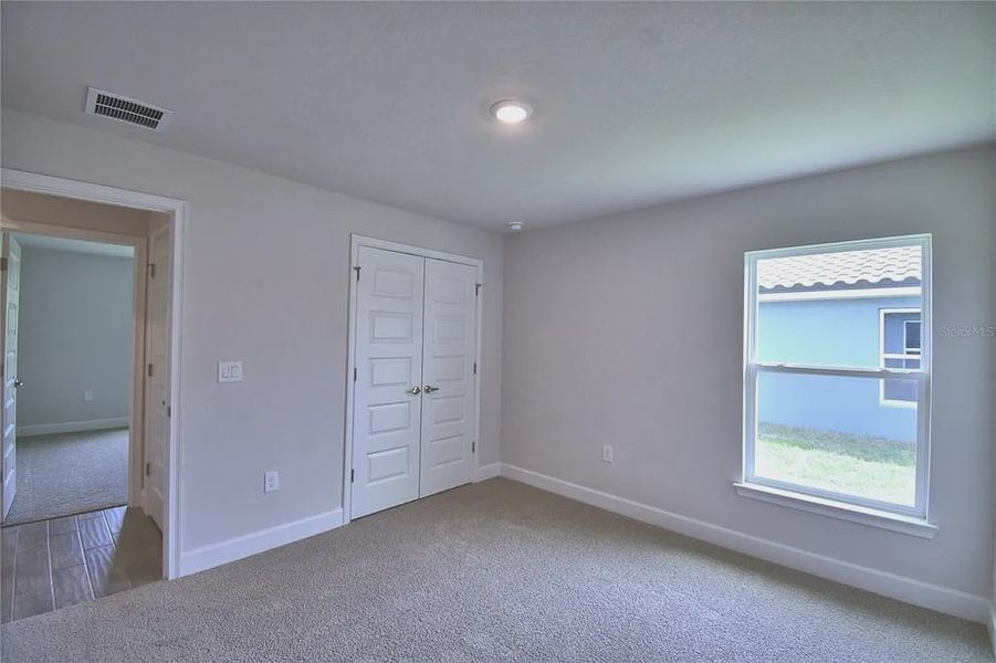 Spacious, unfurnished interior of a new home in Lake Juliana Estates, Auburndale (Image 32).