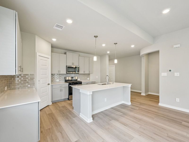 Furnished interior view inside a new home in Heights of Barbers Hill, Baytown (Image 6).