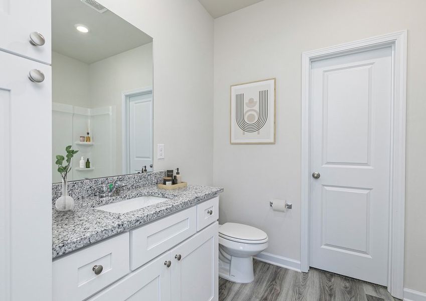 Get ready for your day in the master bathroom