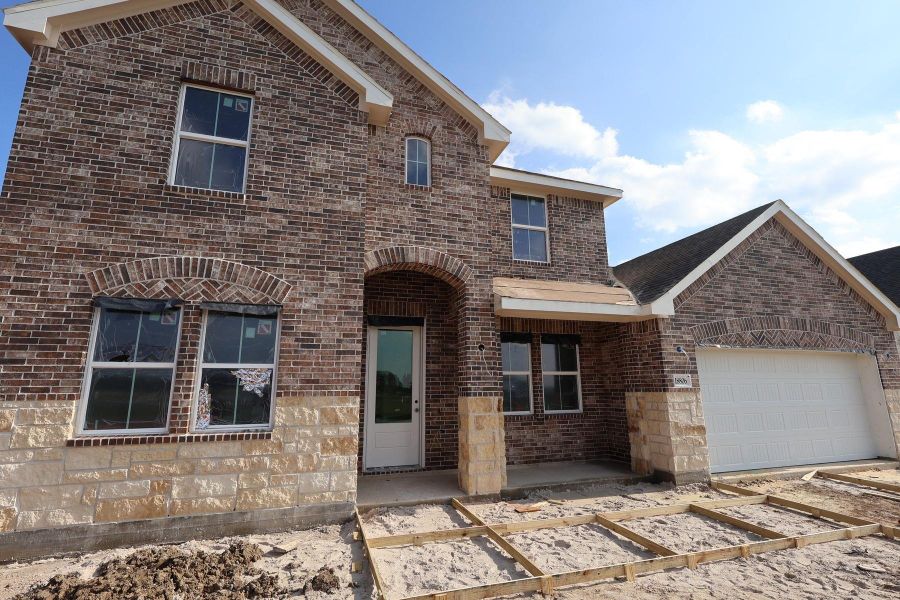 Two story home with 4 beds, 3.5 baths, and 2 car garage