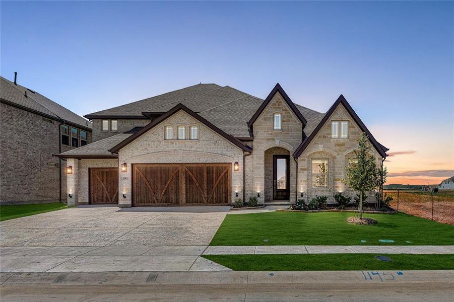 Front exterior of a new home in Chaparral Park, Oak Point, TX, highlighting curb appeal (Image 1). Front exterior of a new home in Chaparral Park, Oak Point, TX, highlighting curb appeal (Image 1).