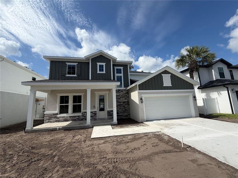 Front exterior of a new home in , Tampa, FL, highlighting curb appeal (Image 2). Front exterior of a new home in , Tampa, FL, highlighting curb appeal (Image 2).