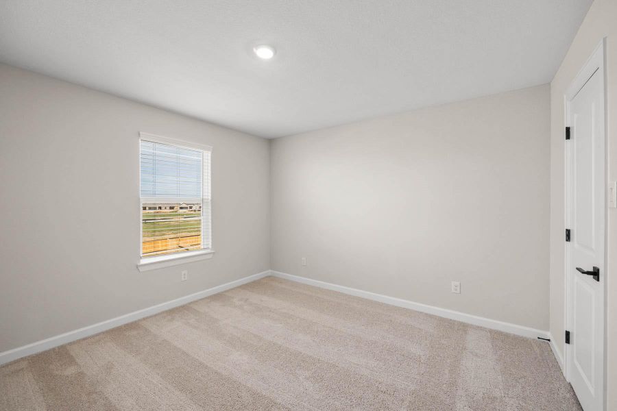 Spacious, unfurnished interior of a new home in Sunterra, Katy (Image 12).